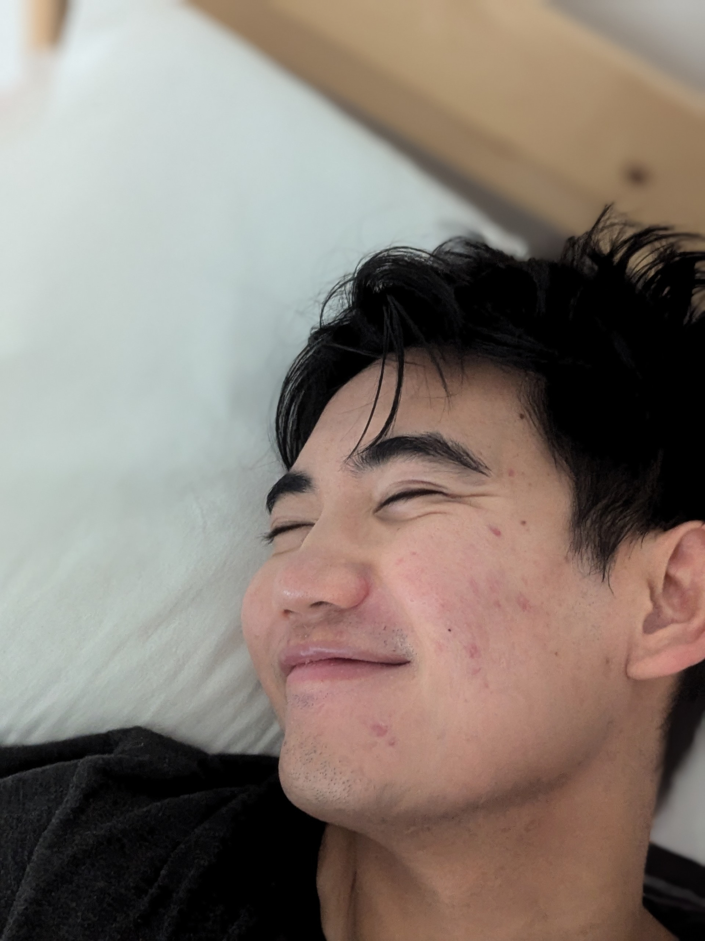 Mat grinning with eyes closed