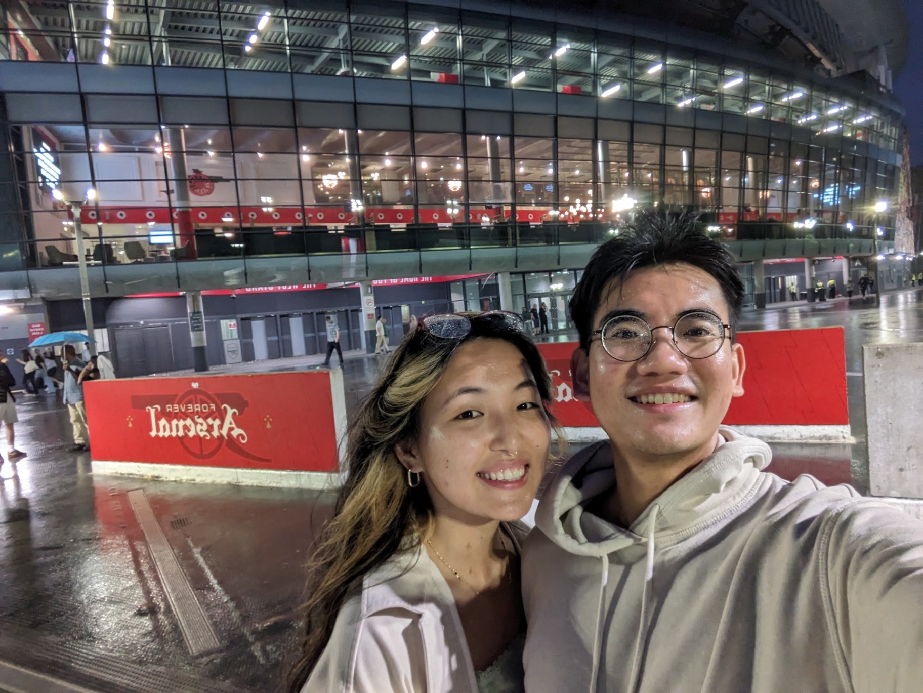 Mat and partner outside the Arsenal stadium